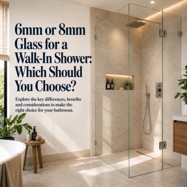 Modern walk-in shower enclosure with thick clear glass panel in luxury UK bathroom renovation