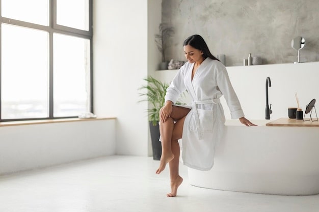 a women enjoying walk in bath shower