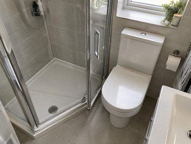 shower door swing clearance hitting toilet UK bathroom